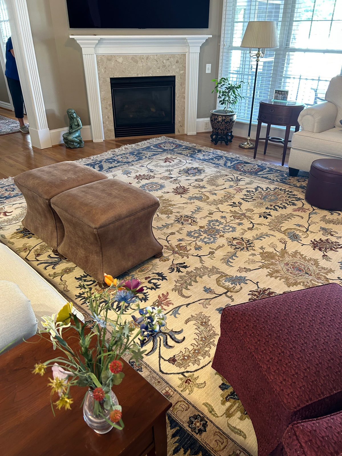 Rug near fireplace in customer home
