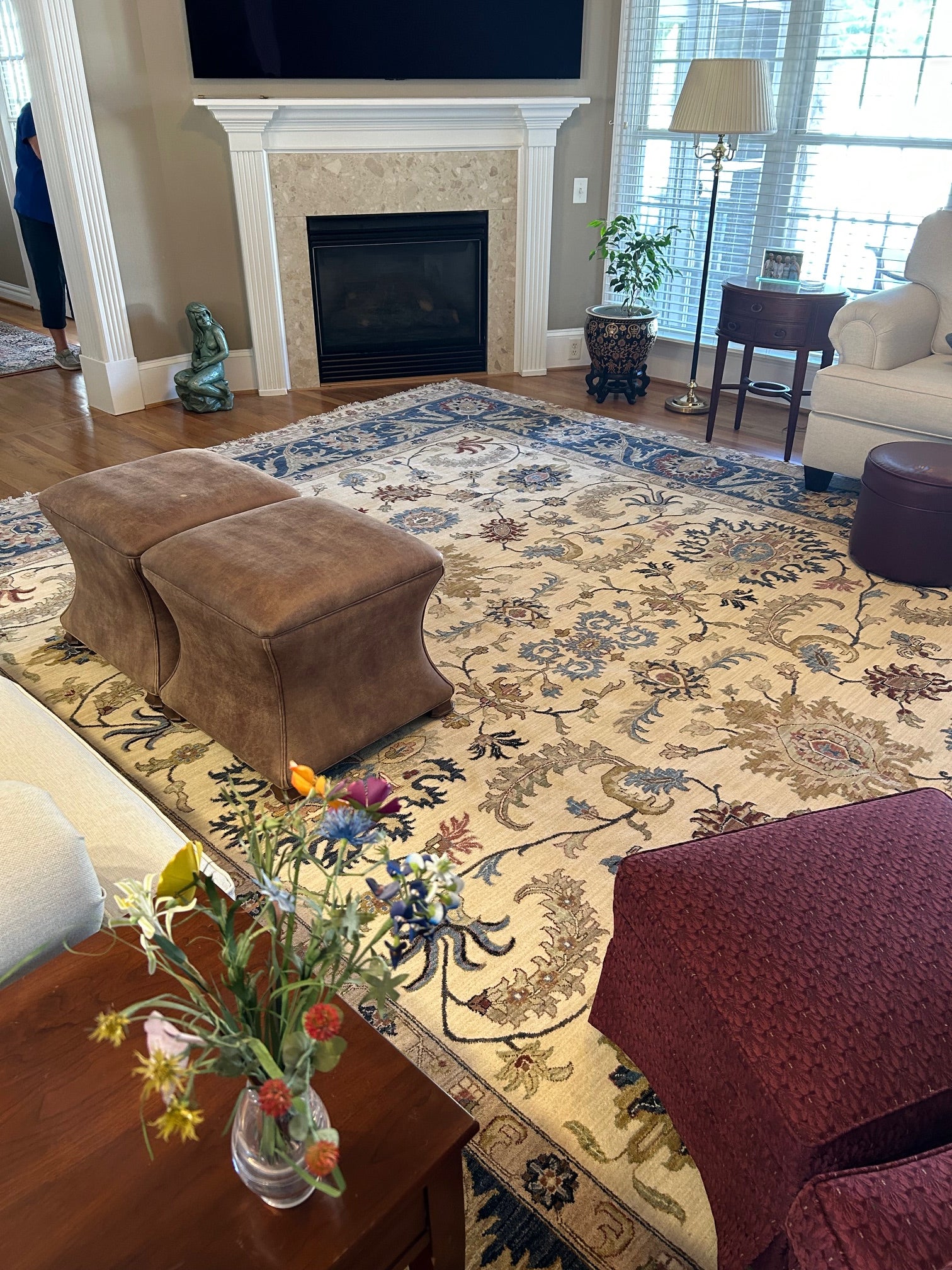 Rug near fireplace in customer home