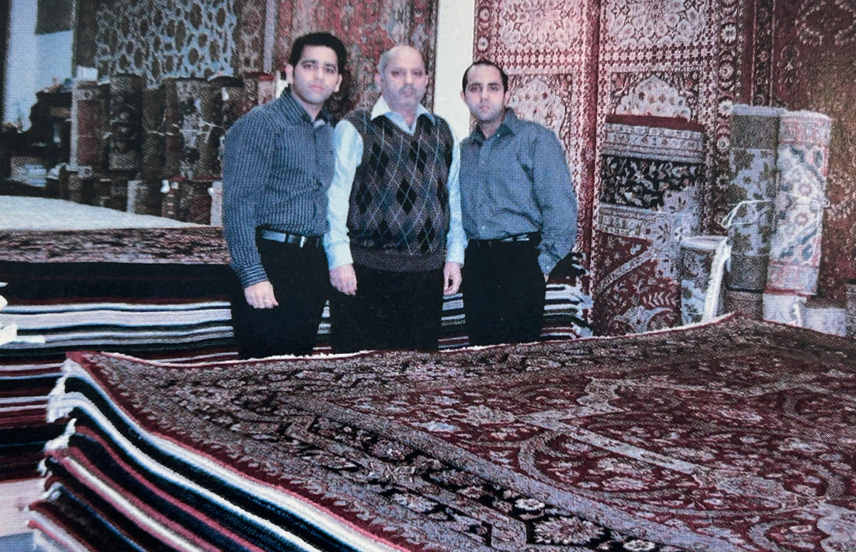 The Wahi family in their rug showroom, 2007